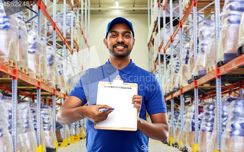 Image of delivery man or warehouse worker with clipboard