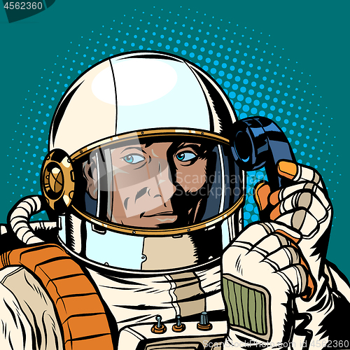 Image of serious astronaut talking on a retro phone