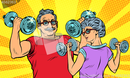 Image of an elderly man and woman grandma grandpa retired in sports, fitness dumbbell
