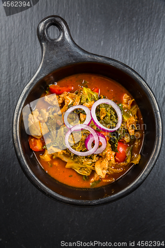 Image of Savoy cabbage stew or soup with chicken