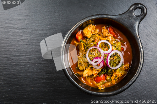 Image of Savoy cabbage stew or soup with chicken