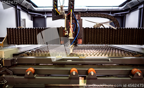 Image of CNC Laser cutting of metal, modern industrial technology.