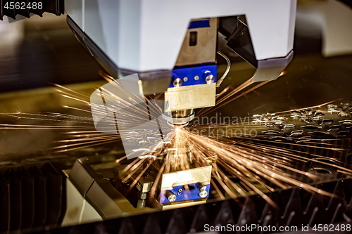 Image of CNC Laser cutting of metal, modern industrial technology.