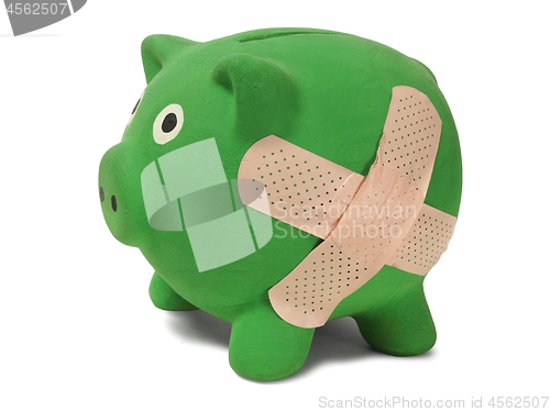 Image of Piggy bank with band-aid