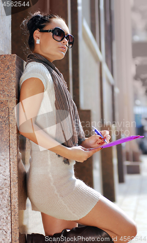 Image of business woman looking away