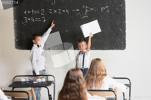 Image of School children in classroom at lesson