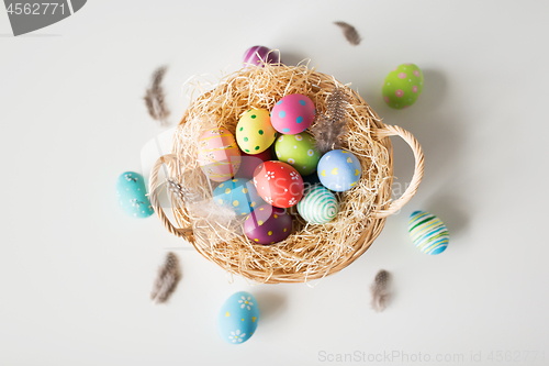 Image of colored easter eggs in basket