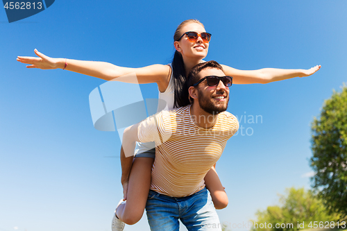 Image of happy couple having fun in summer