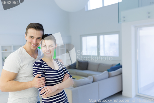 Image of couple hugging in their new home