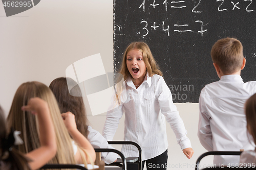 Image of School children in classroom at lesson