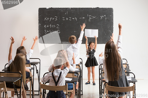 Image of School children in classroom at lesson