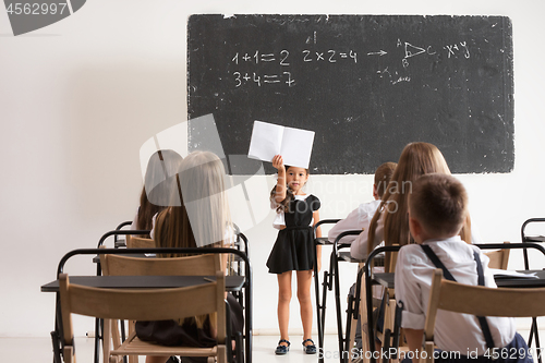 Image of School children in classroom at lesson