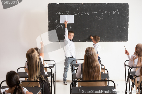 Image of School children in classroom at lesson