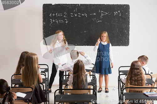 Image of School children in classroom at lesson