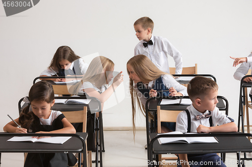 Image of School children in classroom at lesson