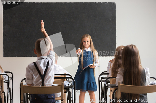 Image of School children in classroom at lesson