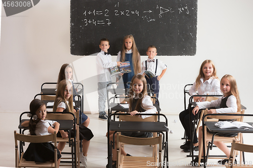 Image of School children in classroom at lesson