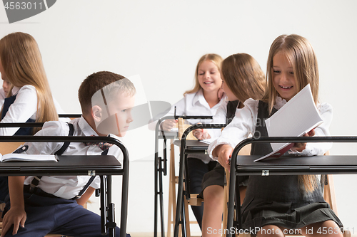 Image of School children in classroom at lesson