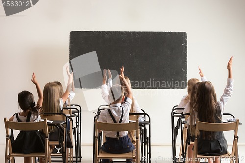 Image of School children in classroom at lesson