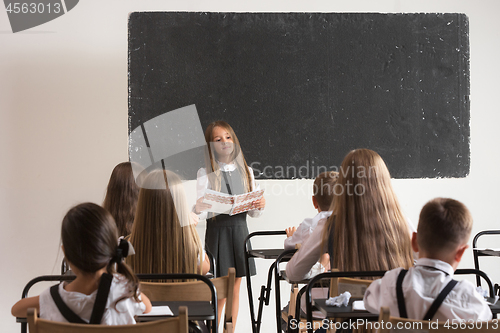 Image of School children in classroom at lesson