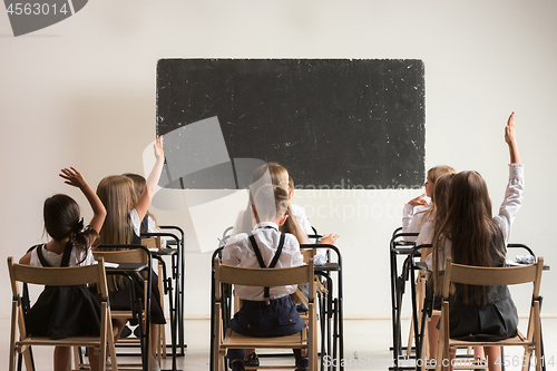 Image of School children in classroom at lesson