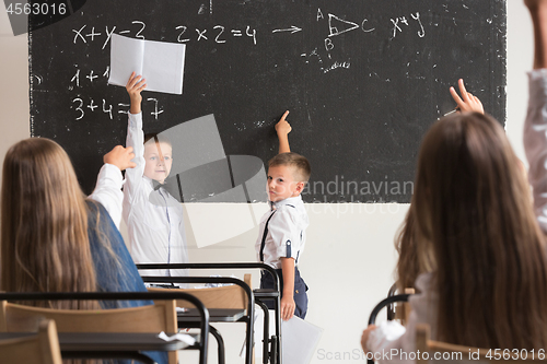 Image of School children in classroom at lesson