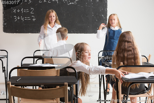 Image of School children in classroom at lesson