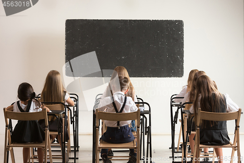 Image of School children in classroom at lesson