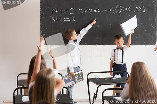 Image of School children in classroom at lesson