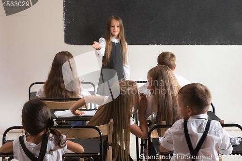 Image of School children in classroom at lesson