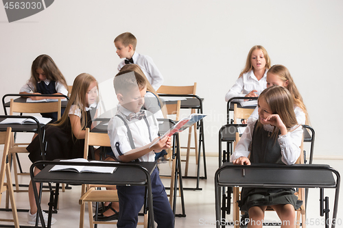 Image of School children in classroom at lesson