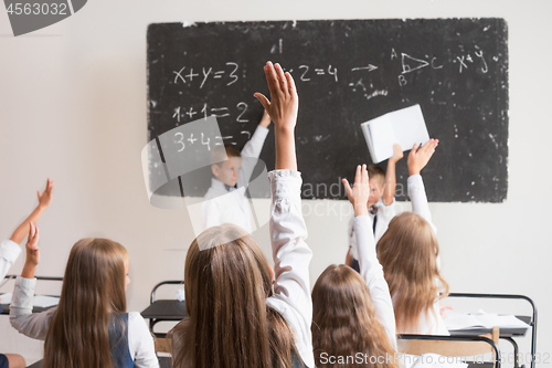 Image of School children in classroom at lesson