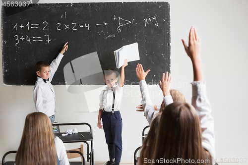 Image of School children in classroom at lesson