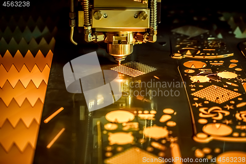 Image of CNC Laser cutting of metal, modern industrial technology.