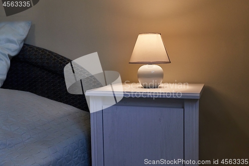 Image of Lamp on a nightstand