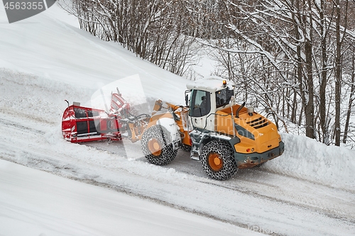 Image of Winter road clearing snowplow