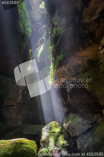 Image of Light beams into the canyon