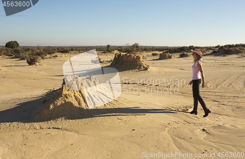 Image of Woman in a desert landscape