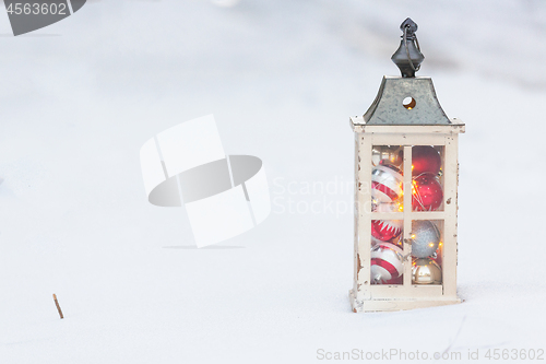 Image of Christmas lantern in the snow