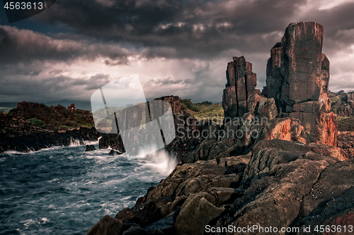 Image of Moody weather over Bombo basalt columns landscape beauty