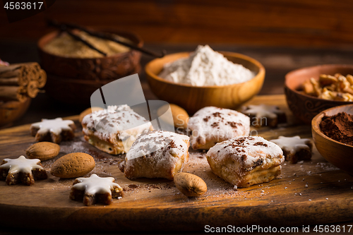 Image of Delicious marzipan cookies for Christmas with baking ingredients