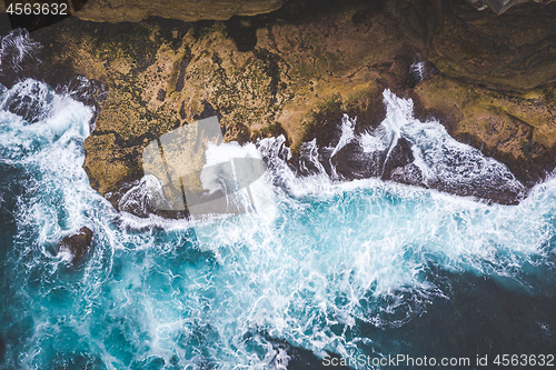 Image of Views of waves tossing around rocks in the ocean