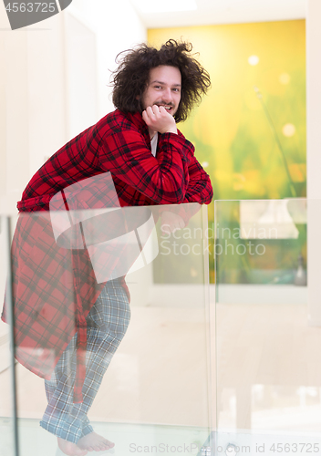 Image of portrait of young man in bathrobe