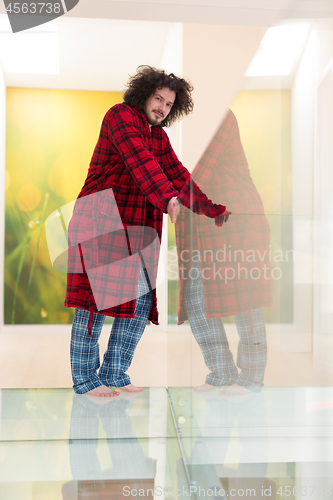 Image of portrait of young man in bathrobe