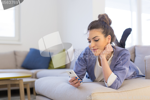 Image of woman using mobile phone