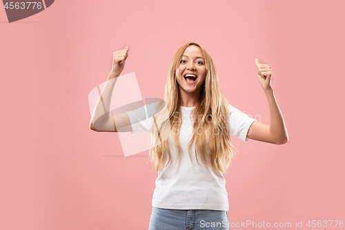 Image of The happy business woman standing and smiling