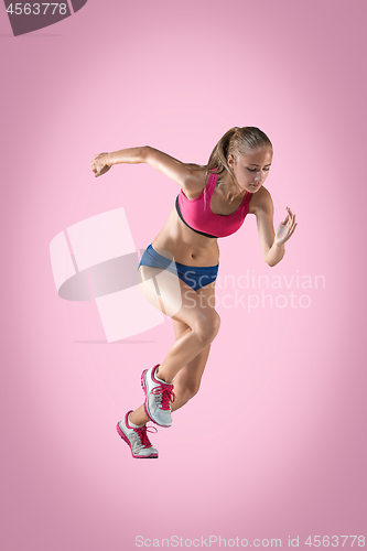 Image of The studio shot of high jump female athlete is in action