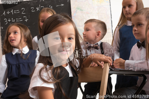 Image of School children in classroom at lesson