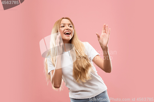 Image of Isolated on pink young casual woman shouting at studio