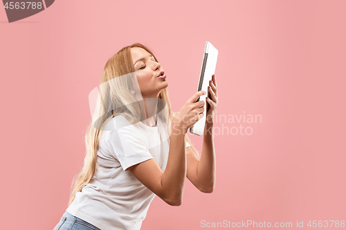 Image of The happy businesswoman with laptop